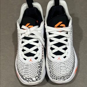 Nike Black and White Sneakers with Orange Highlights